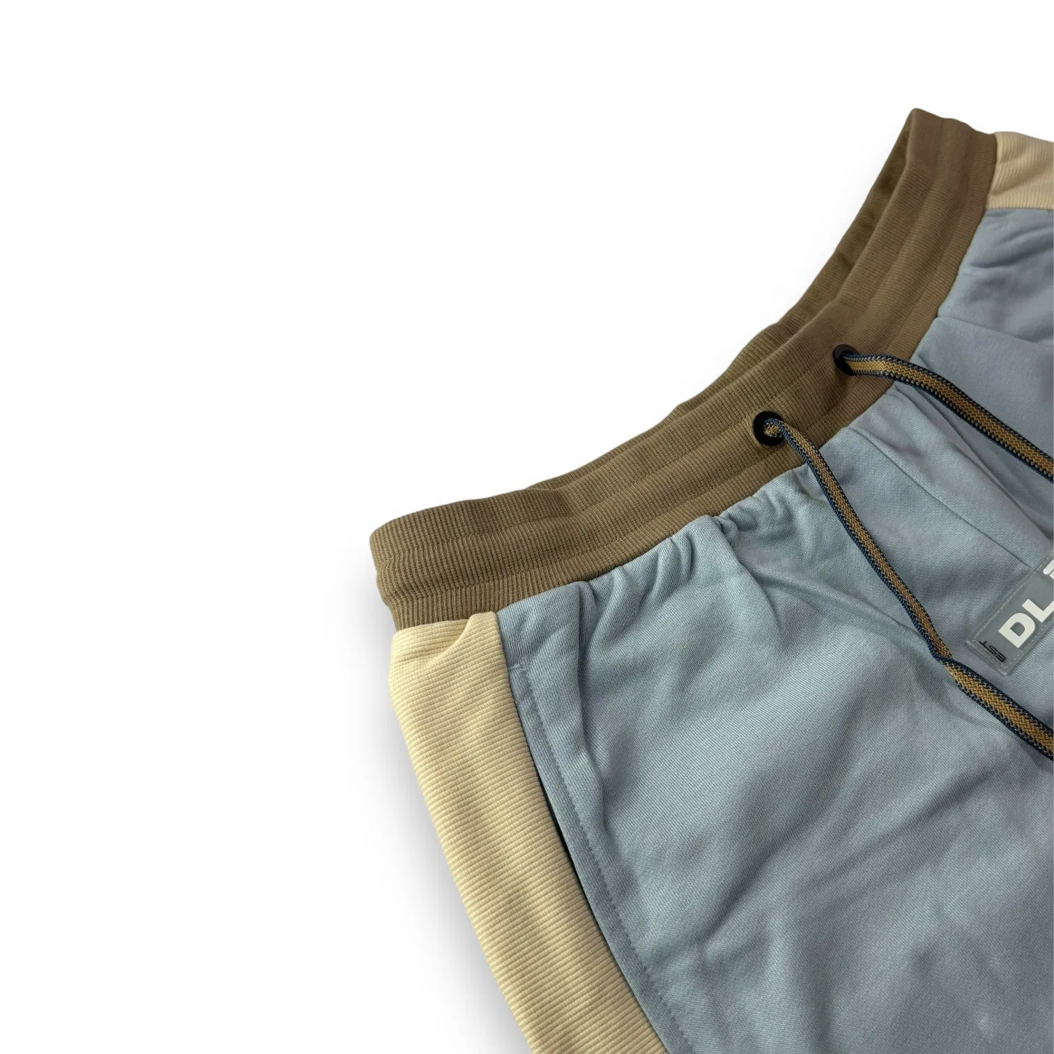Certainly! Heres an optimized title with modifiers for the e-commerce product:

Stylish DLAB Oversized Shorts - Baby Blue, Cream & Brown | Comfortable & Trendy Casual Wear

This title uses adjectives like Stylish, Comfortable, and Trendy to attract potential buyers, while also including all the color options.