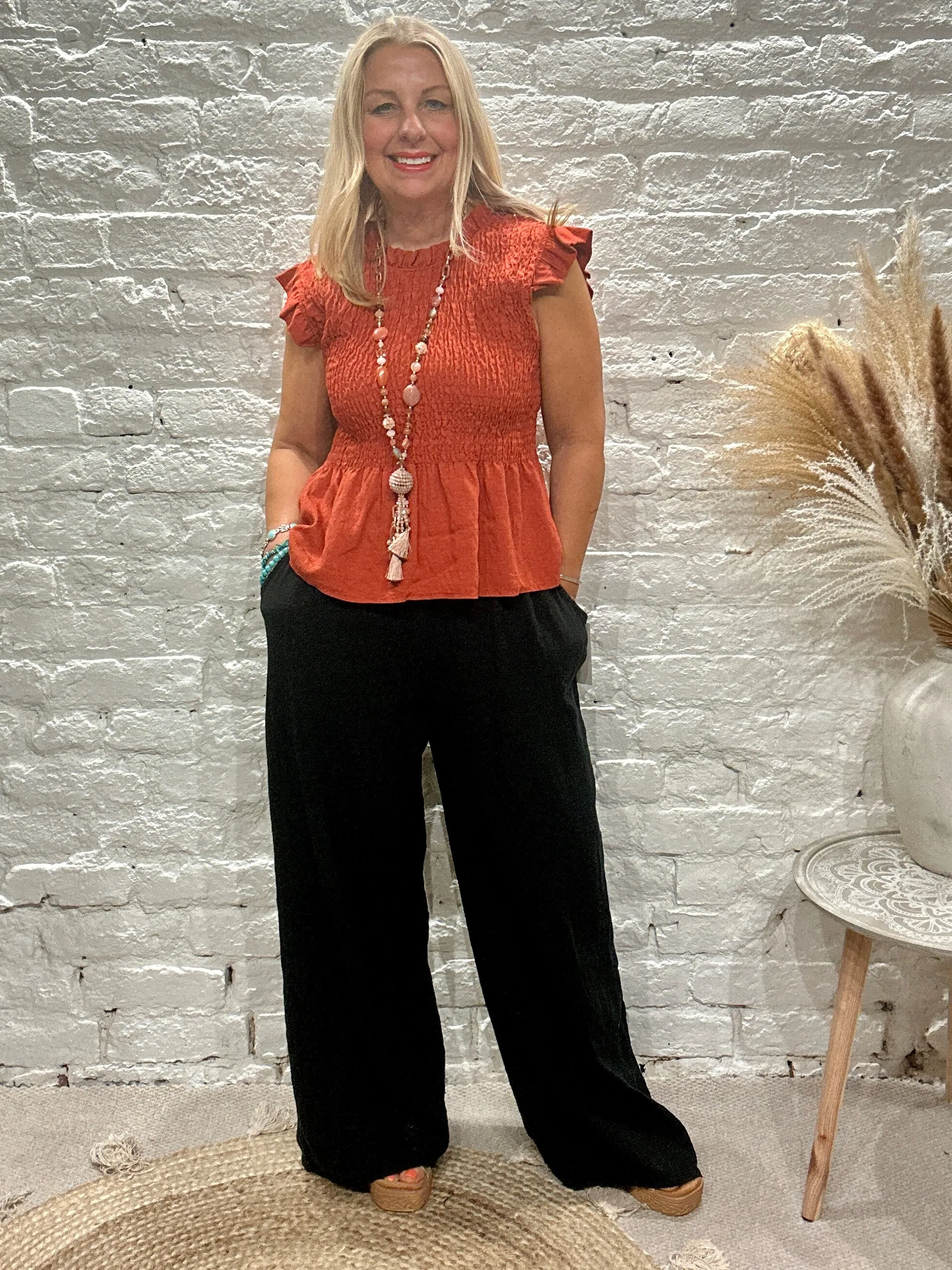 Romantica Sheering Peplum Top