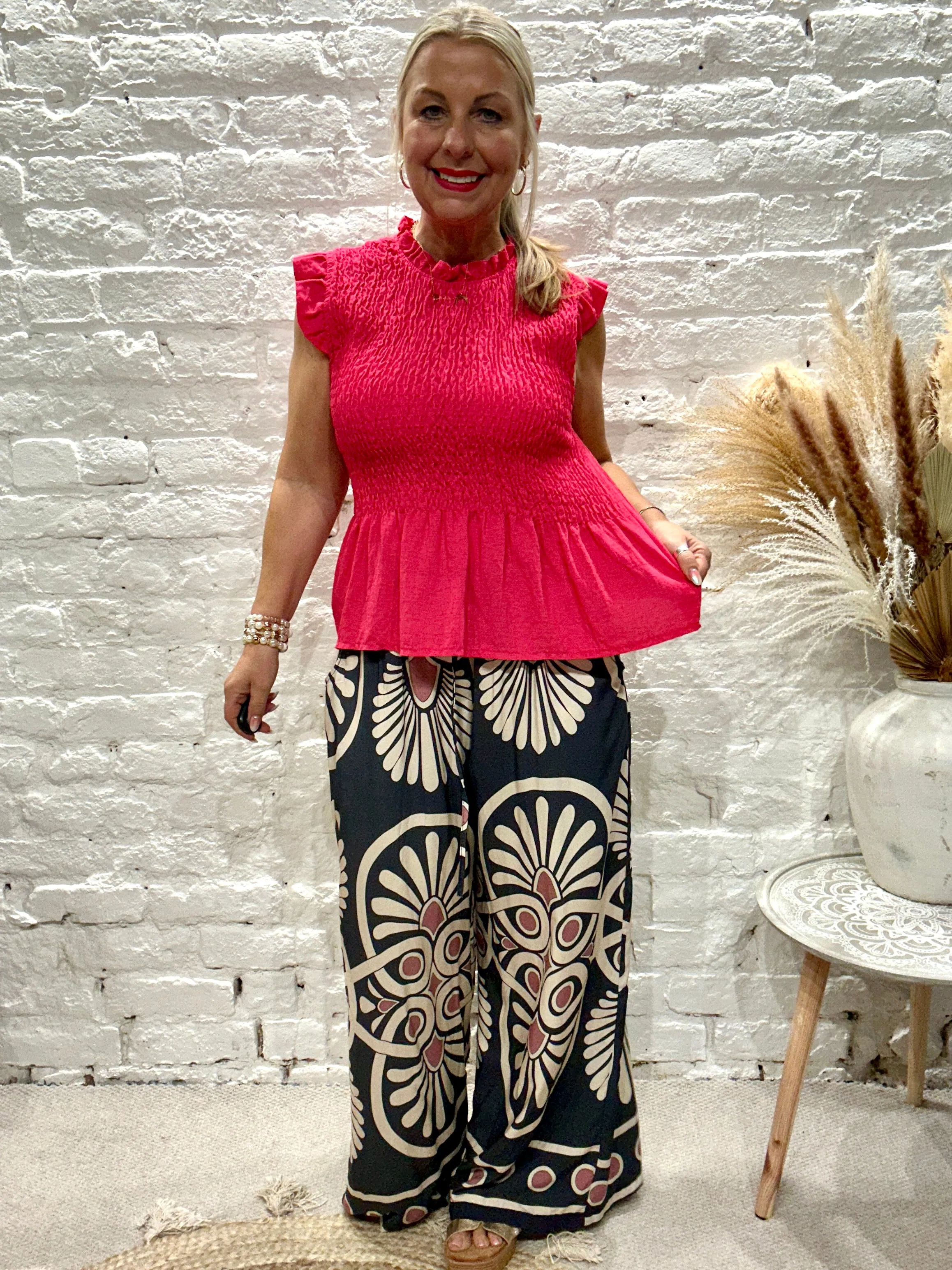 Romantica Sheering Peplum Top