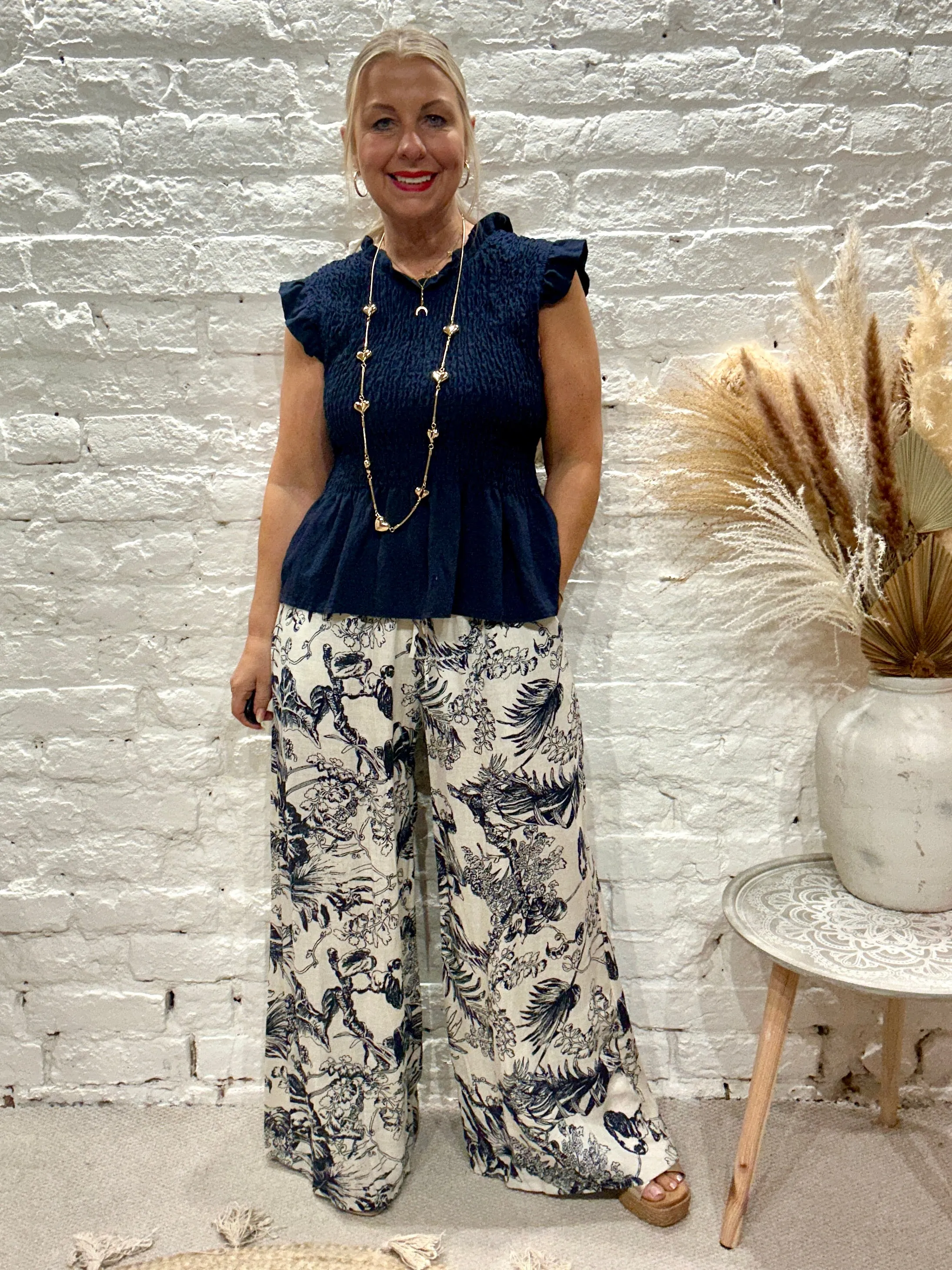 Romantica Sheering Peplum Top